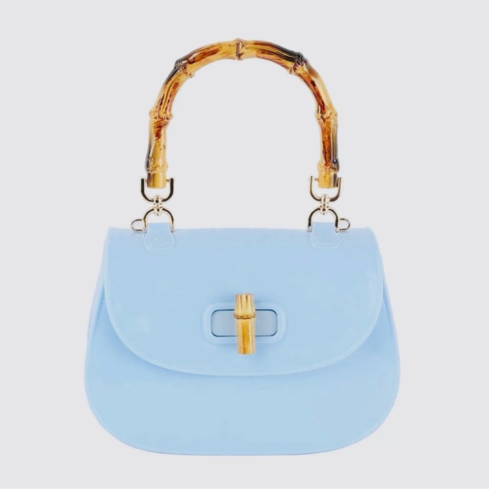 Elegant Blue Handbag with Bamboo Handle with dust bag and box never use.